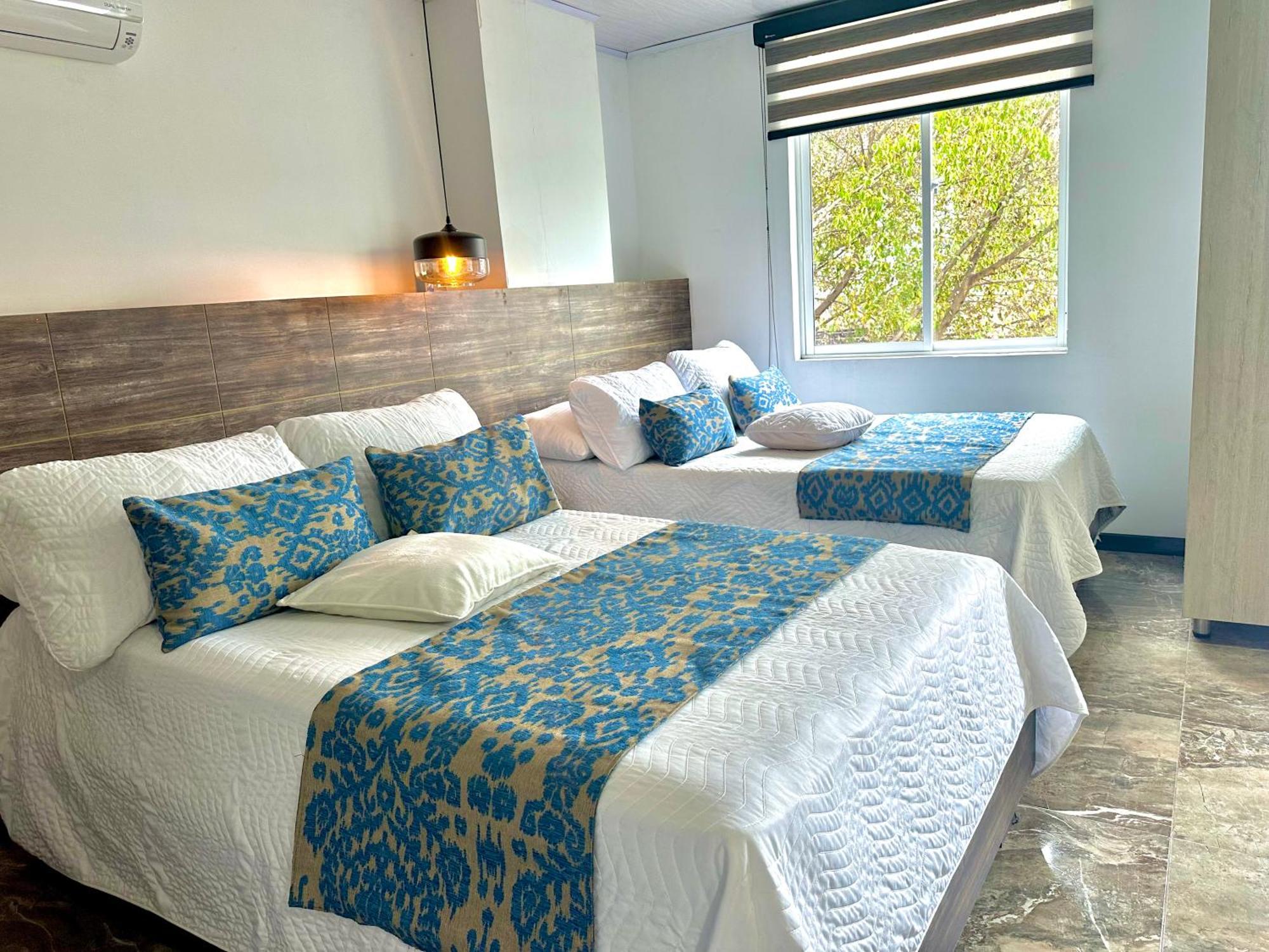 Hotel Los Maderos 卡利 外观 照片