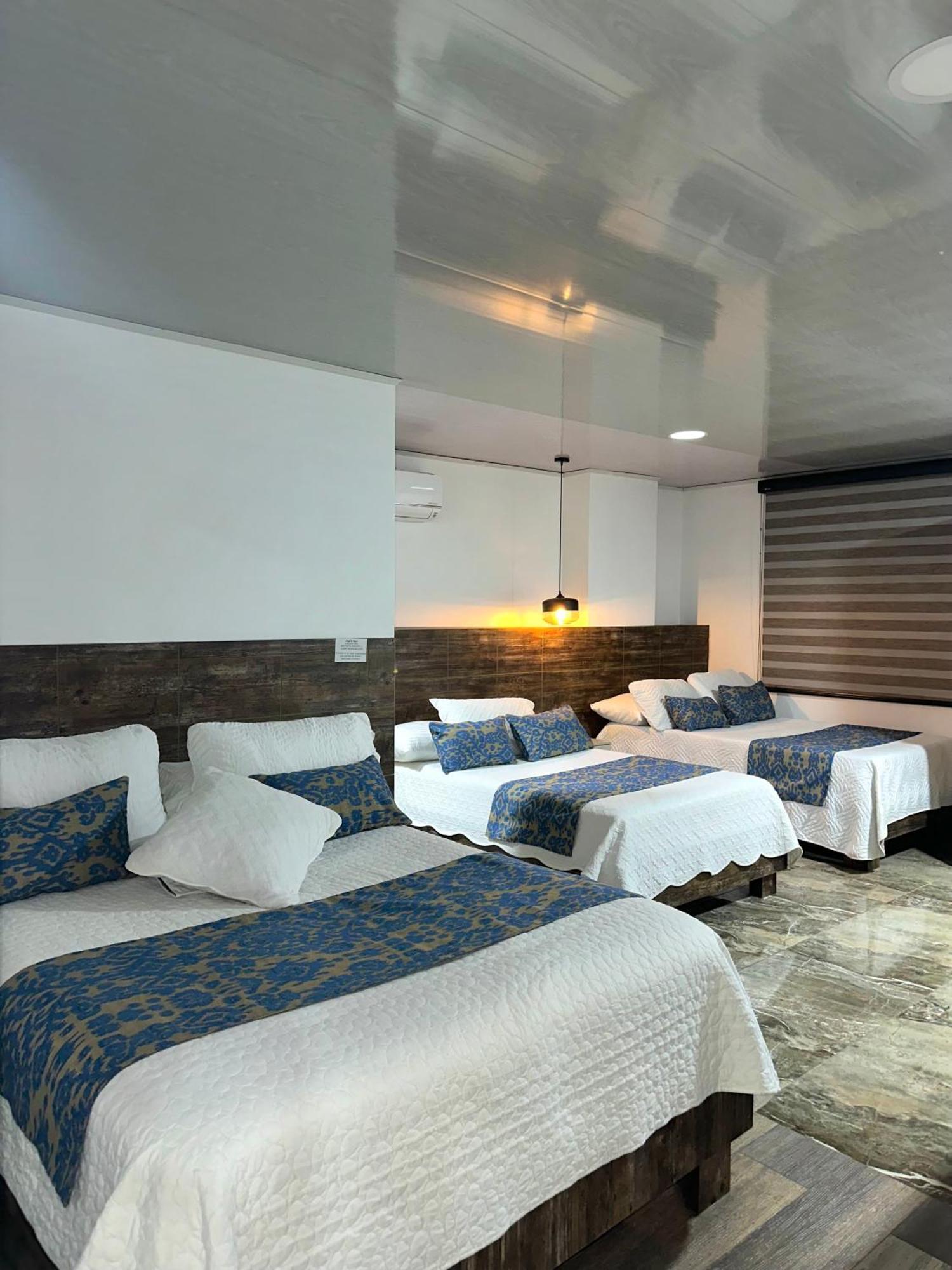 Hotel Los Maderos 卡利 外观 照片